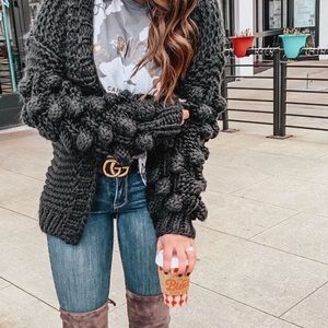 BLACK POM KNOT SWEATER